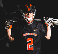 Nate Kabiri, in a Princeton Tigers uniform, Wearing lacrosse equipment for a photo shoot