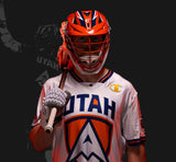 Tom Schreiber, in a Utah Archers uniform, Wearing lacrosse equipment for a photo shoot