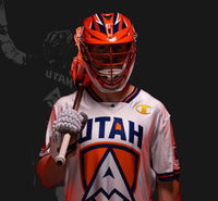 Tom Schreiber, in a Utah Archers uniform, Wearing lacrosse equipment for a photo shoot